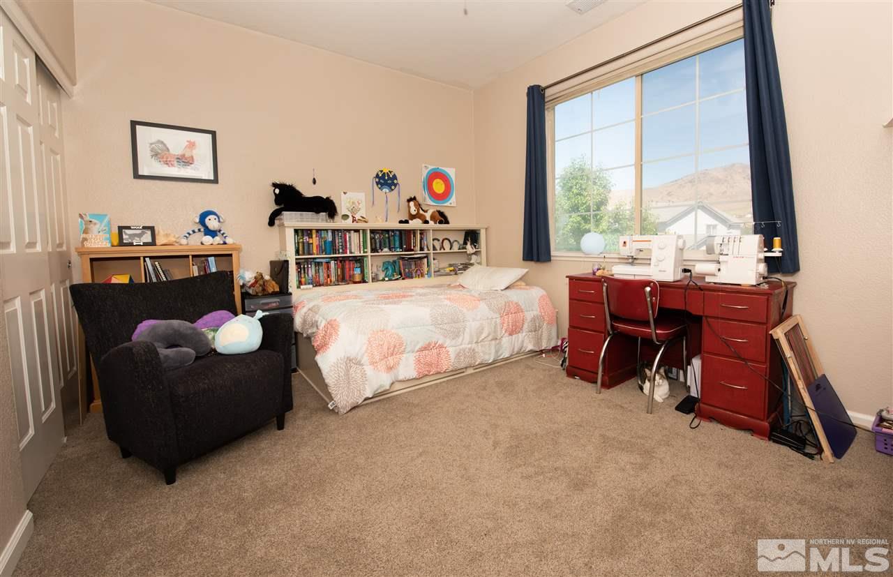 2480 Baton Drive Reno, NV 89521 - Photo 14 of 15 a bed room with furniture and a large window