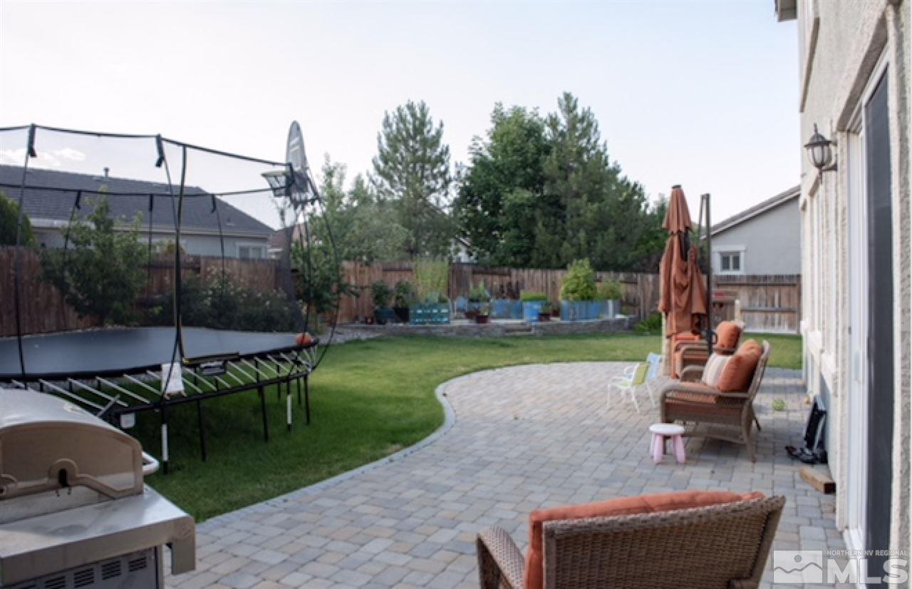 2480 Baton Drive Reno, NV 89521 - Photo 15 of 15 a view of a patio with garden and sitting area