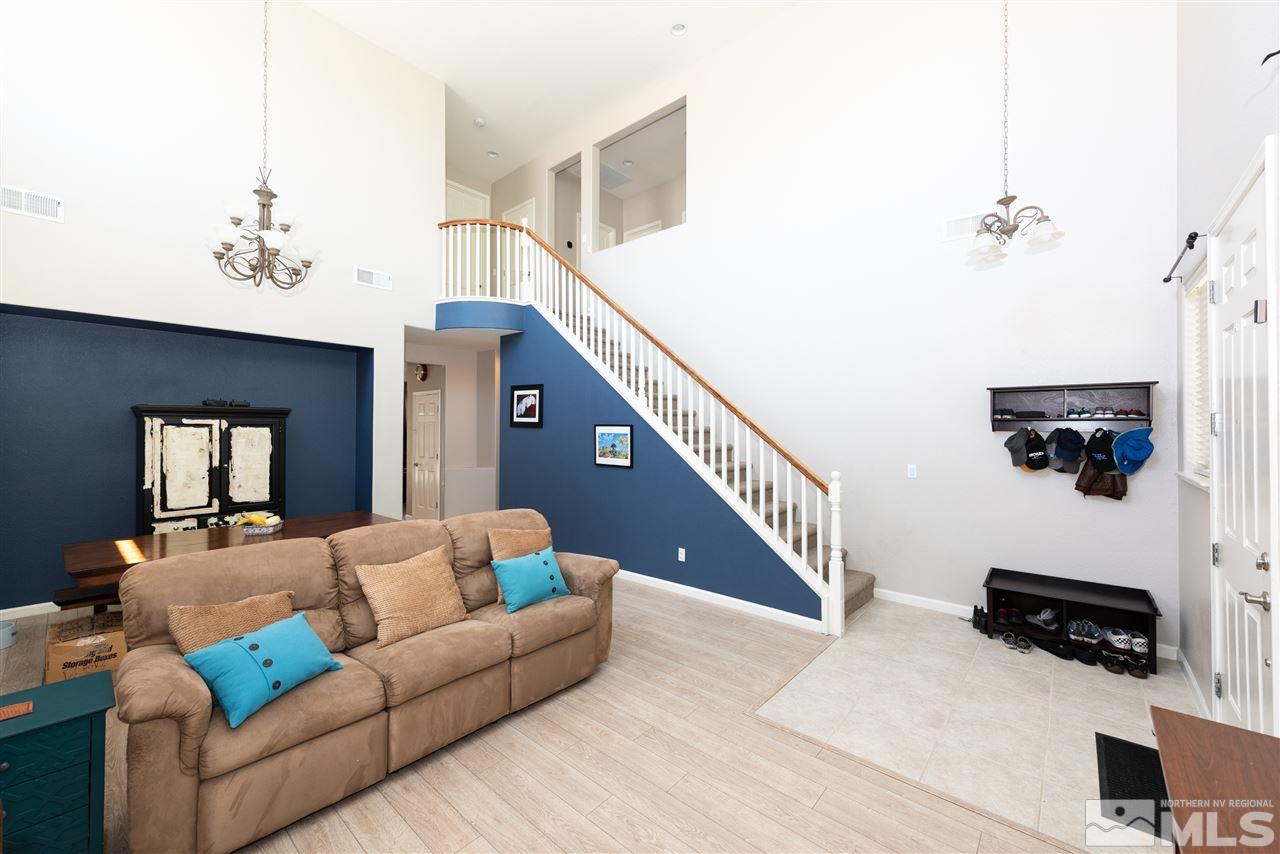 2480 Baton Drive Reno, NV 89521 - Photo 2 of 15 a living room with furniture and a flat screen tv