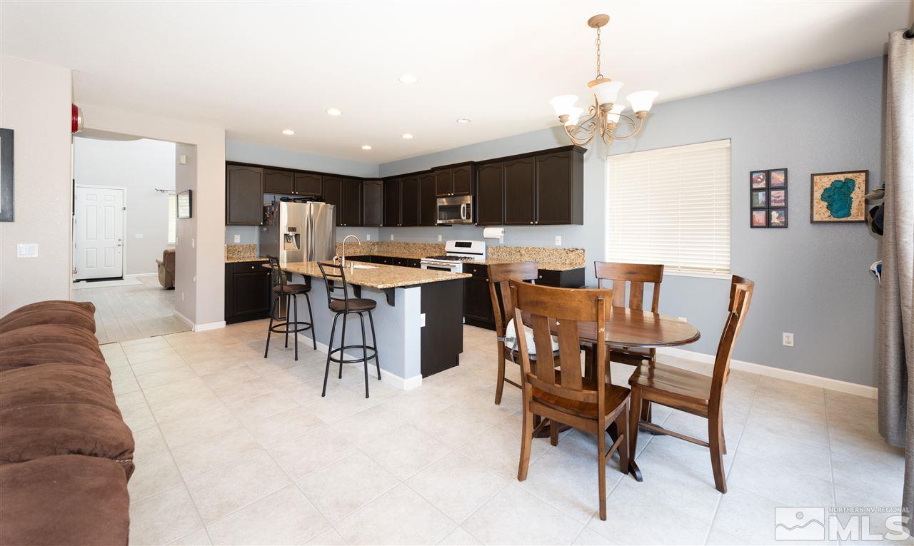2480 Baton Drive Reno, NV 89521 - Photo 7 of 15 a view of a dining room with furniture