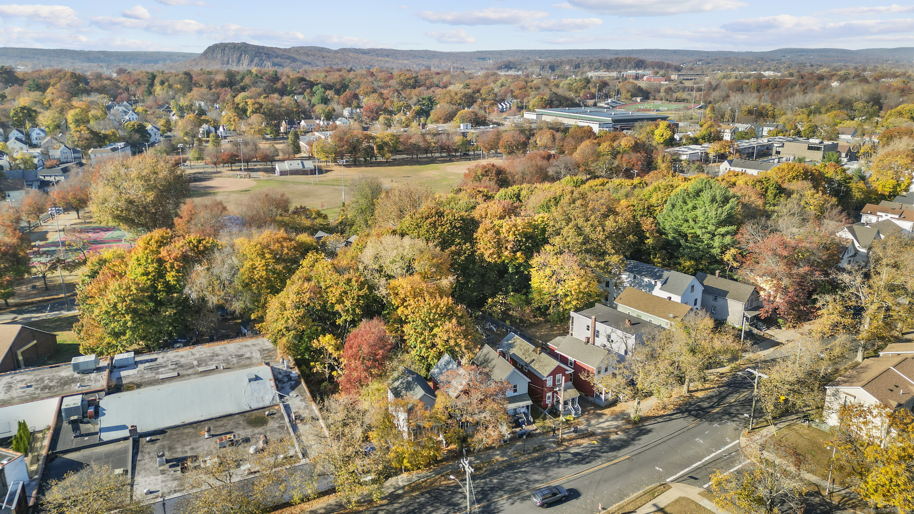an aerial view of residential house with outdoor space