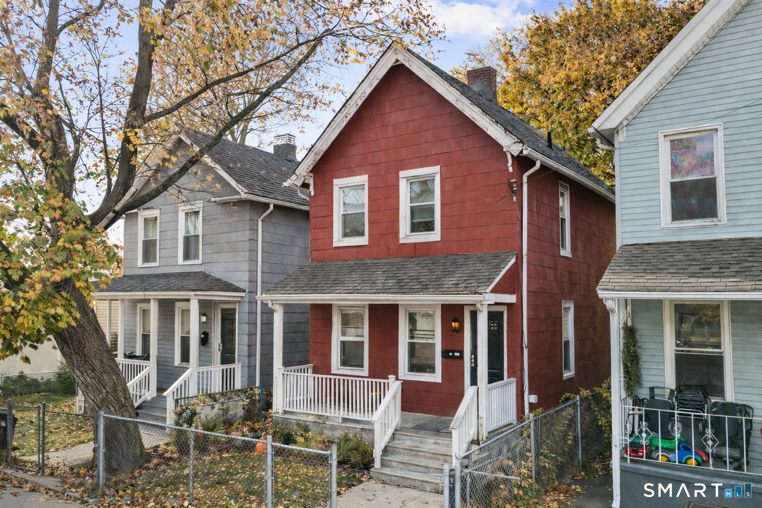 666 Orchard Street New Haven, CT 06511 - Photo 2 of 14 a front view of a house with glass windows