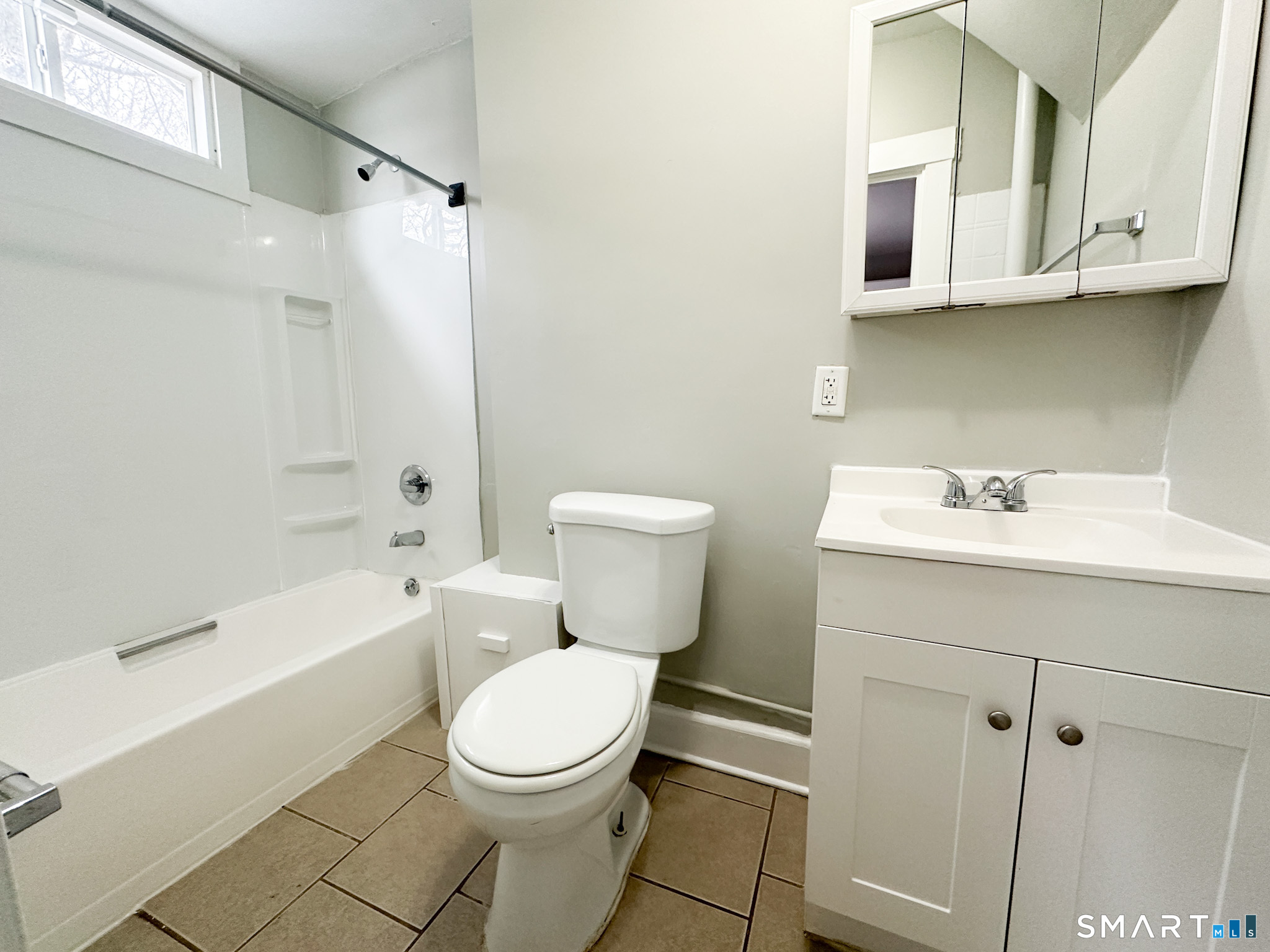 666 Orchard Street New Haven, CT 06511 - Photo 6 of 14 a bathroom with a sink a toilet and bathtub