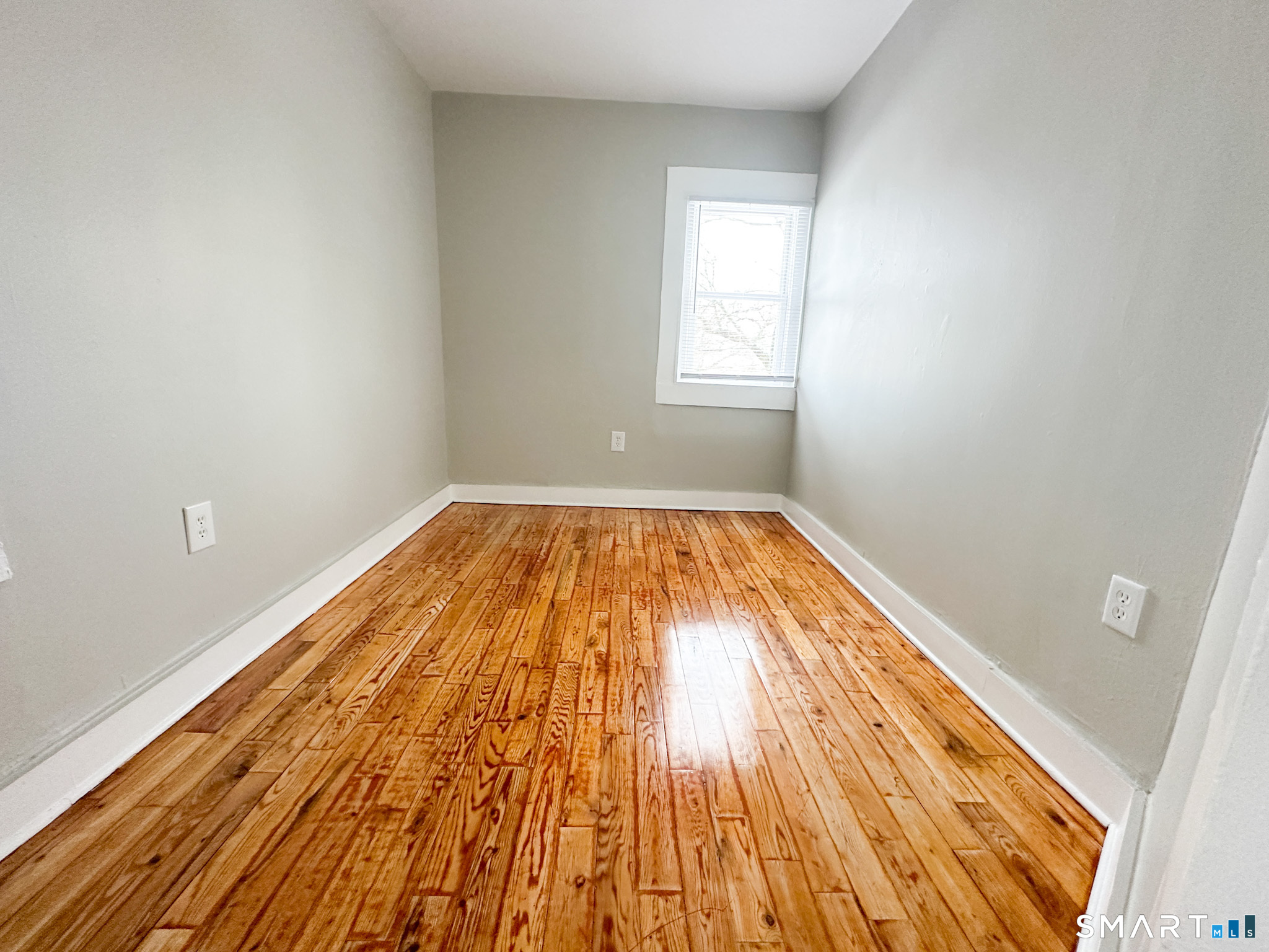666 Orchard Street New Haven, CT 06511 - Photo 7 of 14 wooden floor in a room