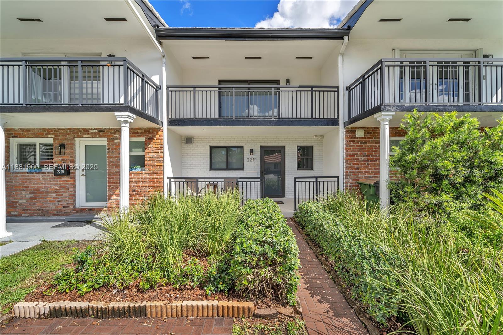 front view of a house with a small yard
