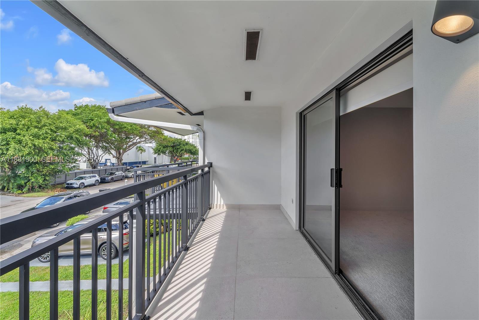 2211 Northeast 122nd Street, Unit 2211 North Miami, FL 33181 - Photo 23 of 34 a view of balcony