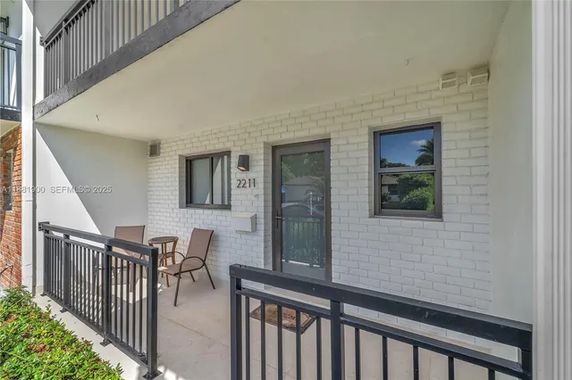 a view of a porch with furniture