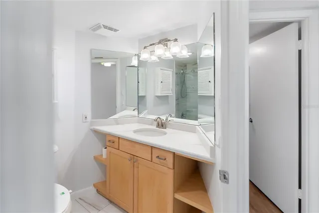 a view of a kitchen with furniture and a window