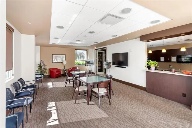 a view of a swimming pool with a yard