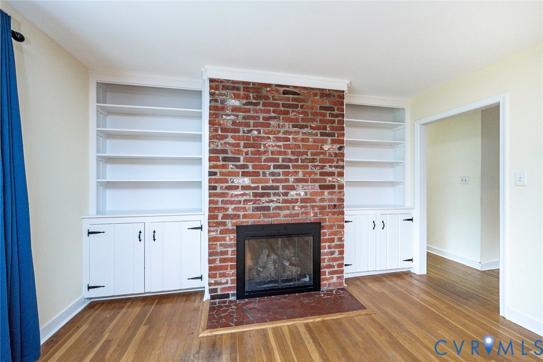 8831 Chippenham Road Richmond, VA 23235 - Photo 13 of 48 Built-ins Flank the Gas Fireplace