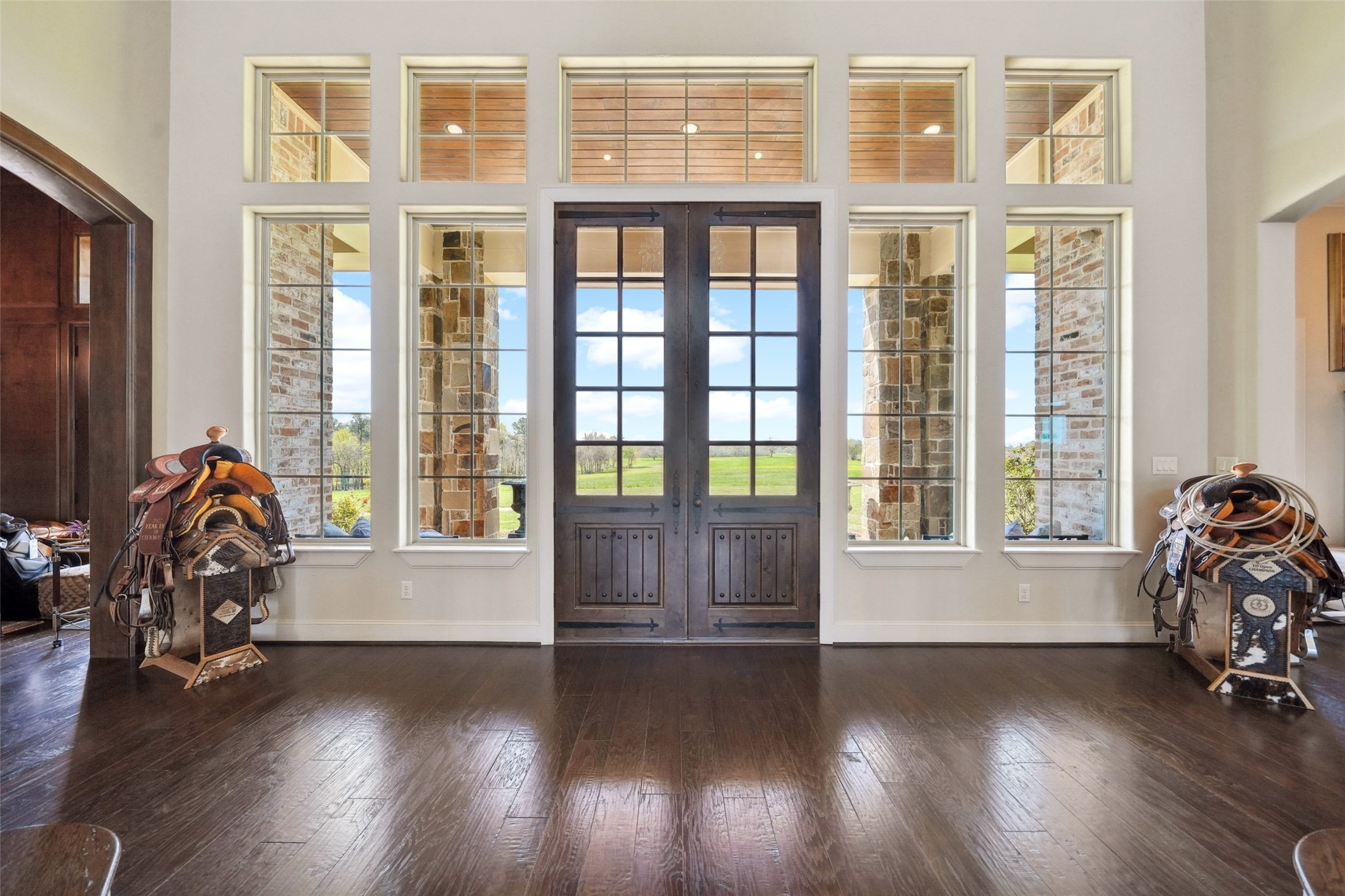460 Bishop Road Huntsville, TX 77320 - Photo 8 of 50 An interior view of the front door, showing the immediate entryway and its design features.