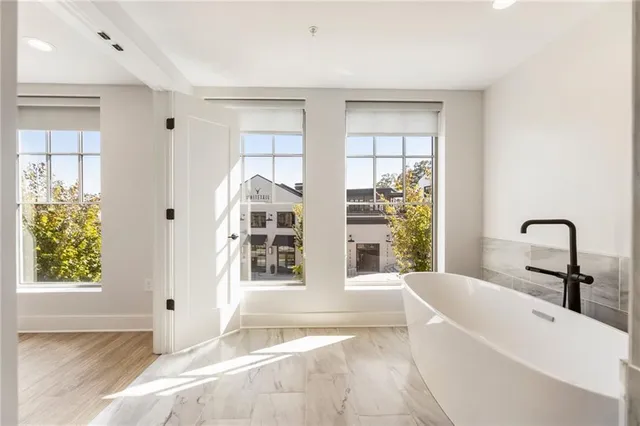 a bathroom with a shower and a sink