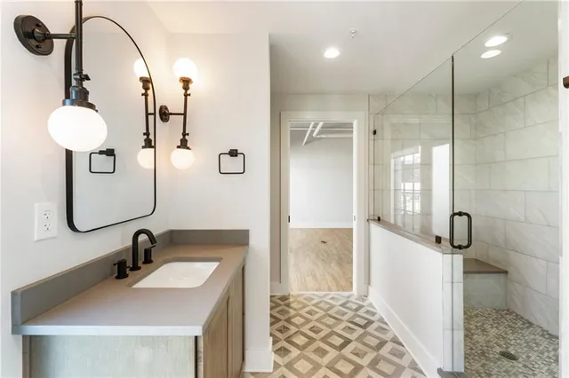 a bathroom with a shower and a bathtub