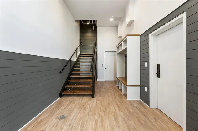 a view of an empty room and fire place