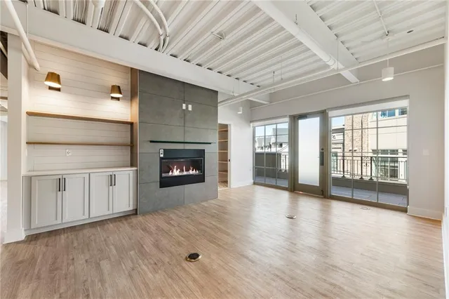 a view of balcony with furniture