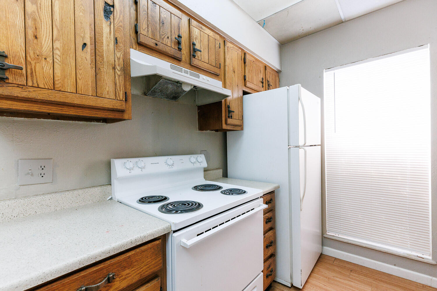 7405 Avenue X, Unit 103 Lubbock, TX 79423 - Photo 15 of 33 a kitchen with stainless steel appliances granite countertop a refrigerator and a stove