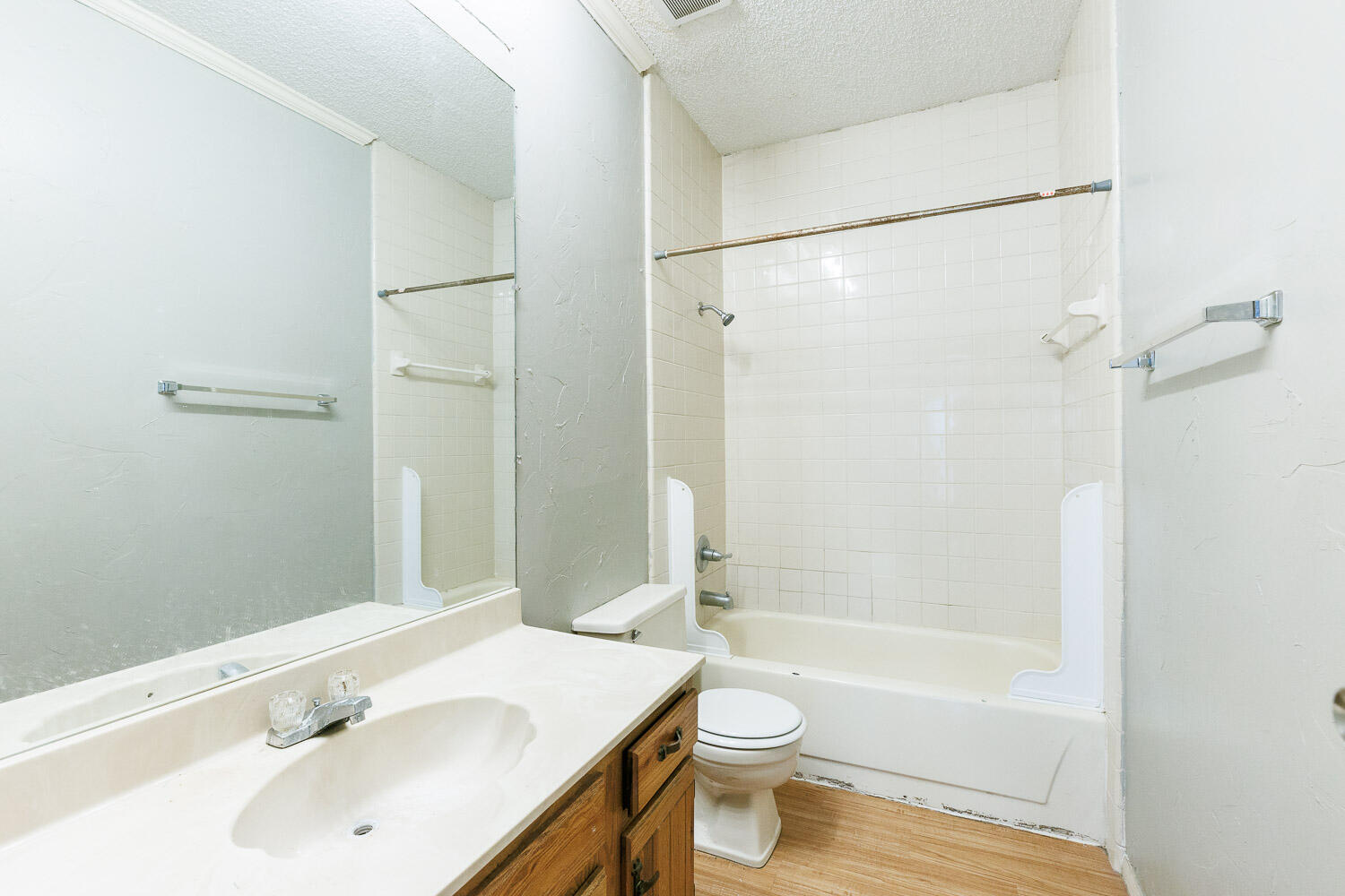 7405 Avenue X, Unit 103 Lubbock, TX 79423 - Photo 23 of 33 a bathroom with a sink toilet and shower