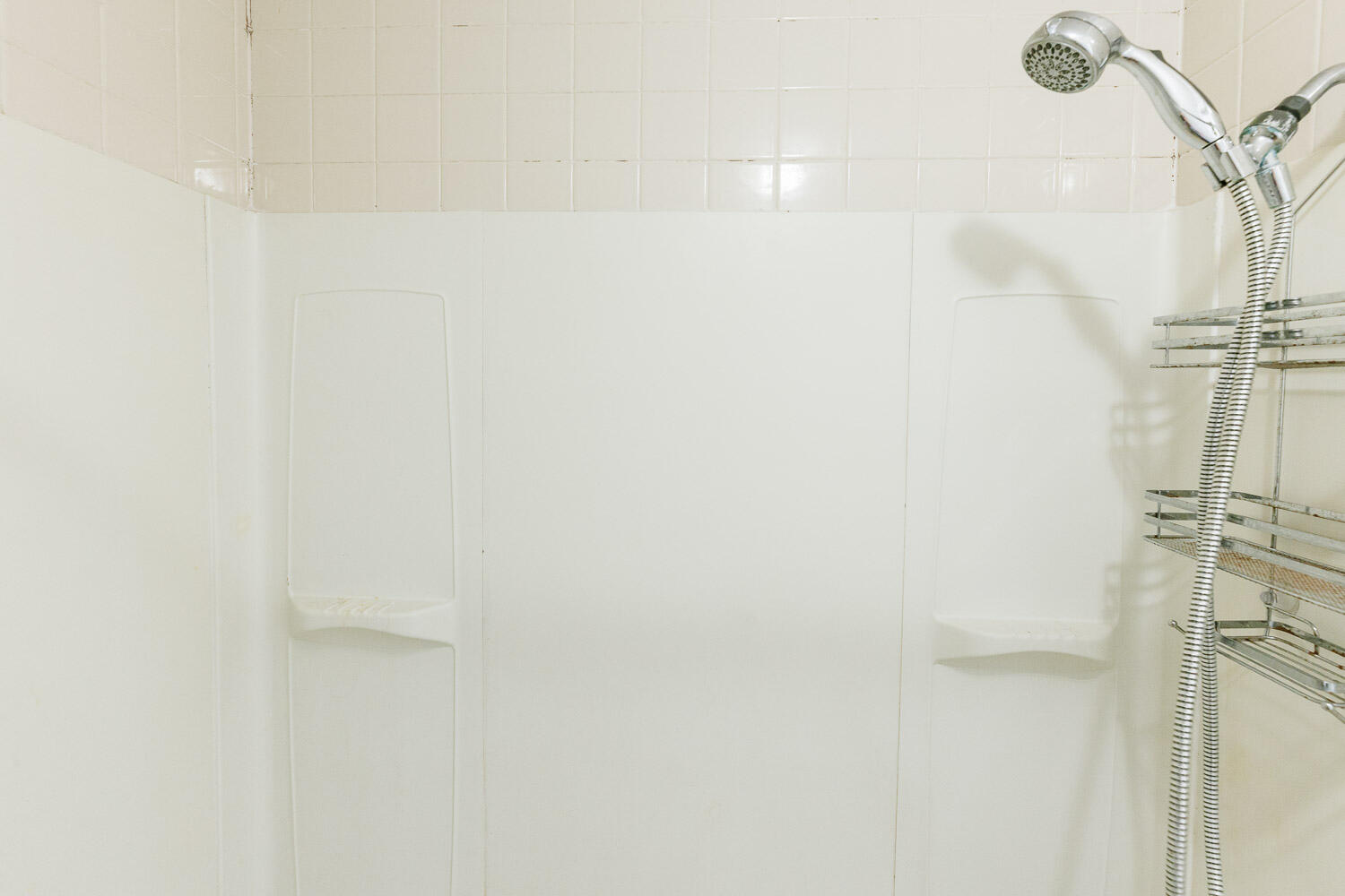 7405 Avenue X, Unit 103 Lubbock, TX 79423 - Photo 31 of 33 a bathroom with a shower