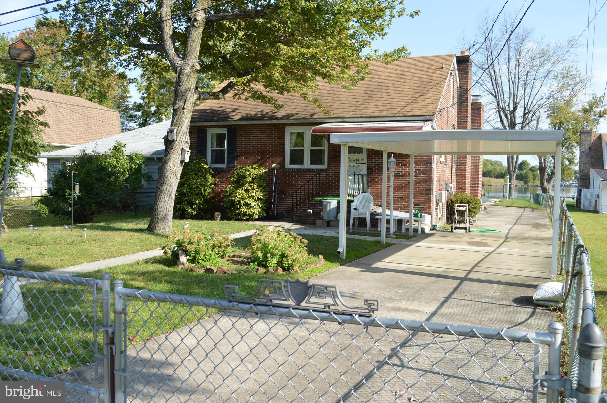 943 Bowleys Quarters Road Baltimore, MD 21220 - Photo 4 of 29 a view of a house with backyard sitting area and garden