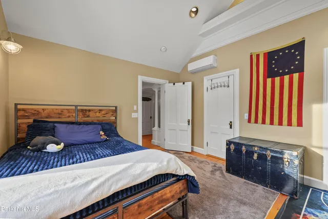 a bathroom with a sink toilet and mirror