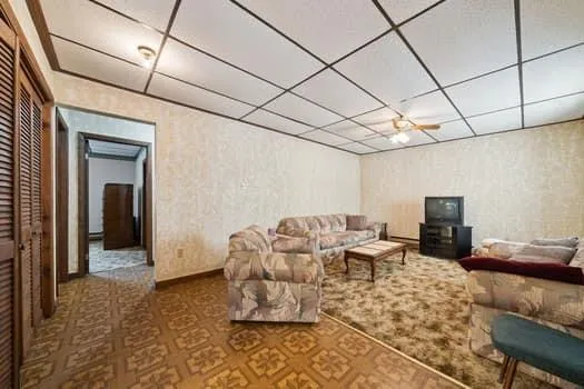 a living room with furniture and a couch