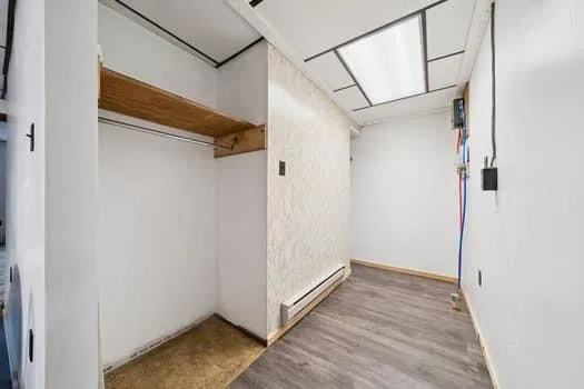 a view of an empty walk in closet