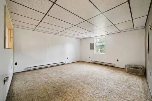 a view of a room with windows