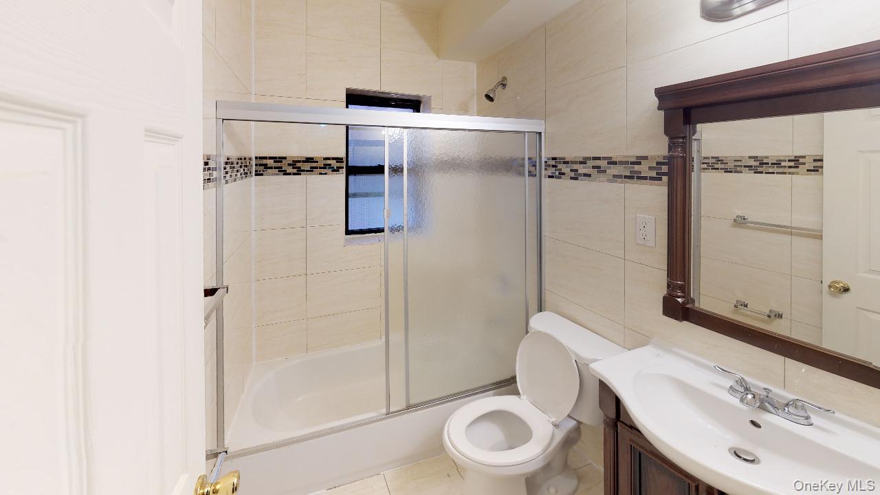 110-19 72nd Road, Unit 3A Queens, NY 11375 - Photo 16 of 20 a bathroom with a sink toilet and shower