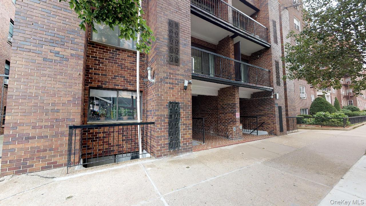 110-19 72nd Road, Unit 3A Queens, NY 11375 - Photo 20 of 20 front view of a house with an empty space