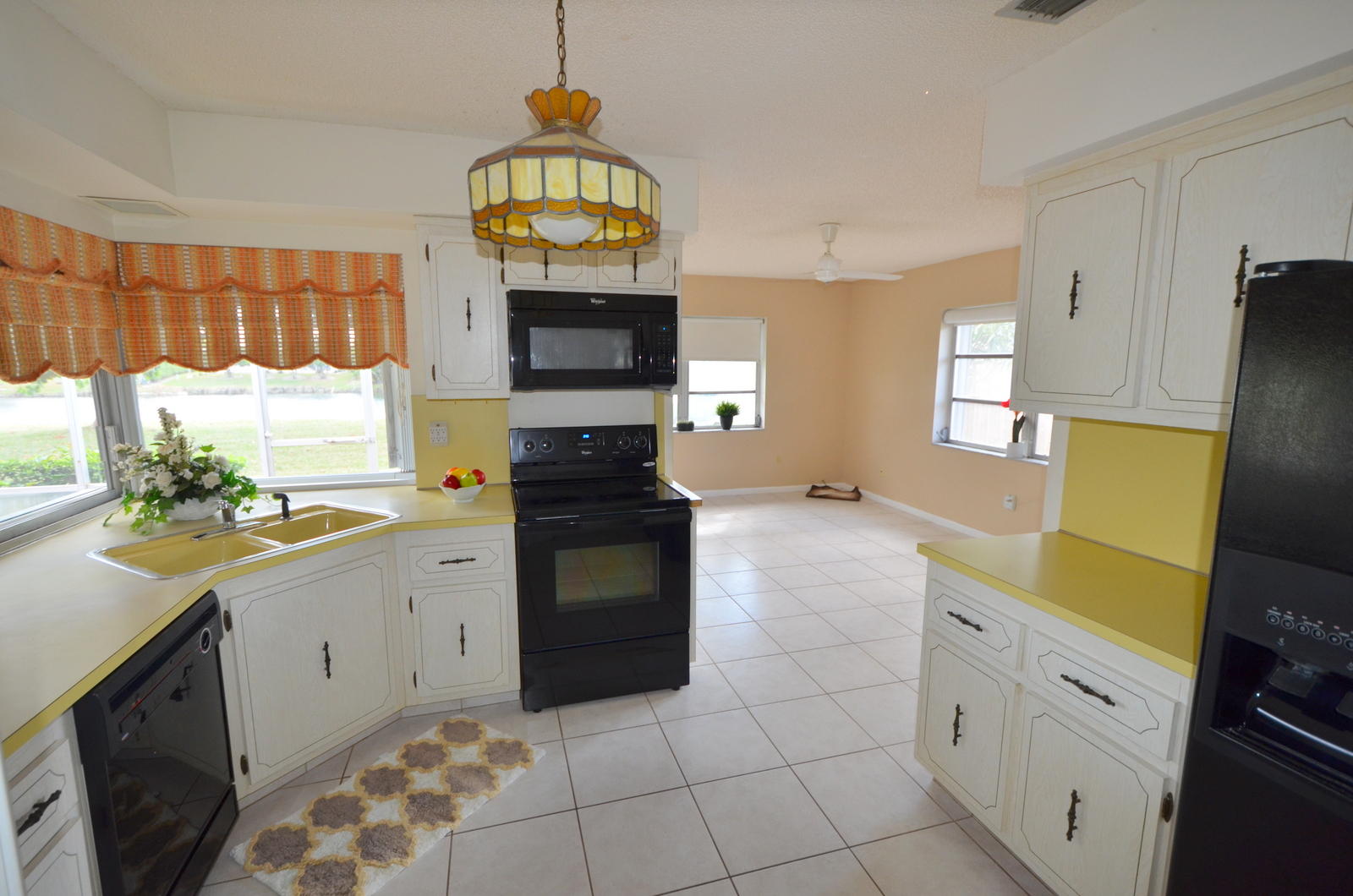 4590 Bison Street Boca Raton, FL 33428 - Photo 9 of 21 Kitchen leading into the family room