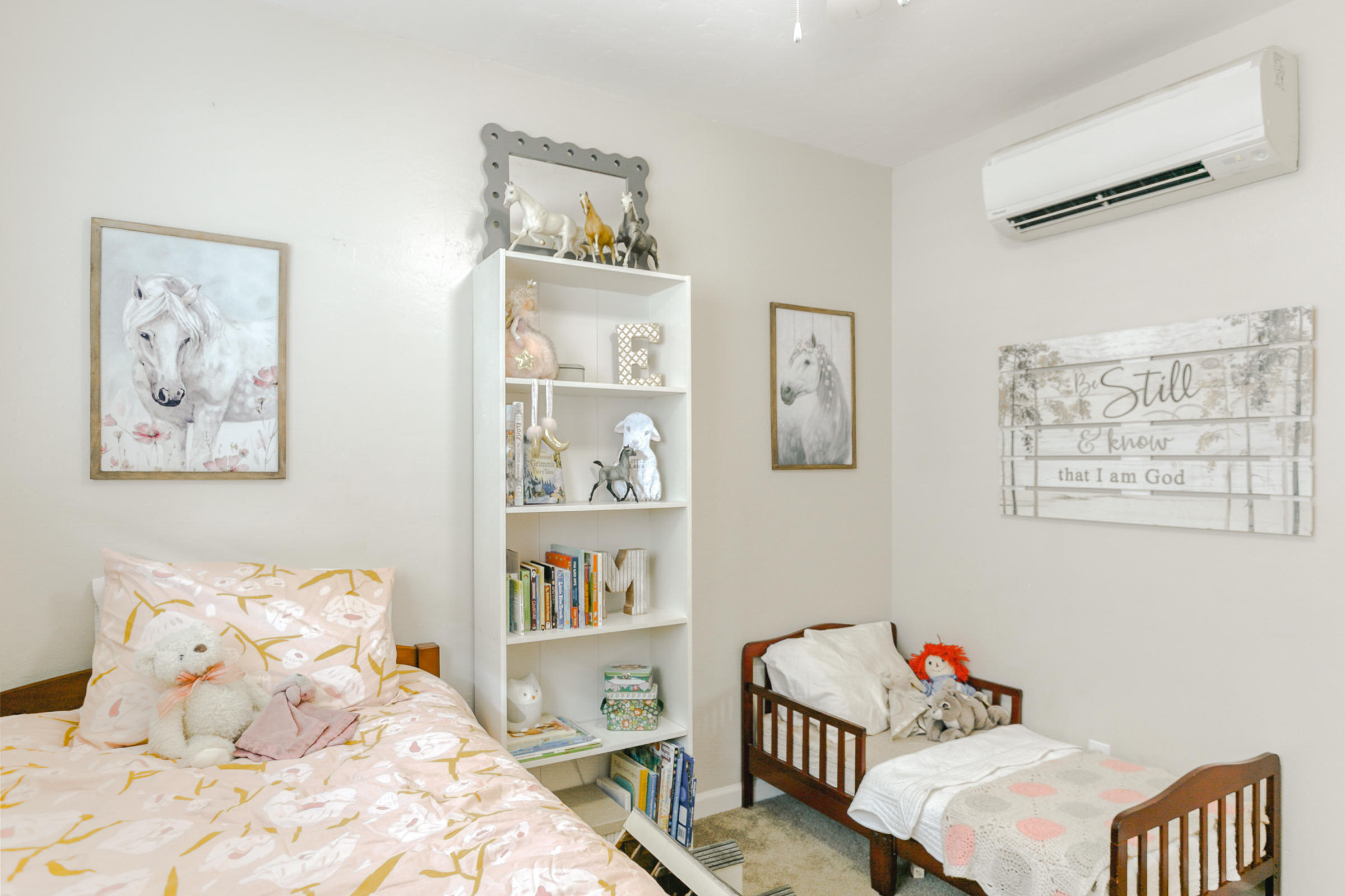 2498 Saturn Redding, CA 96002 - Photo 18 of 40 a bedroom with a bed and wall painting on the wall