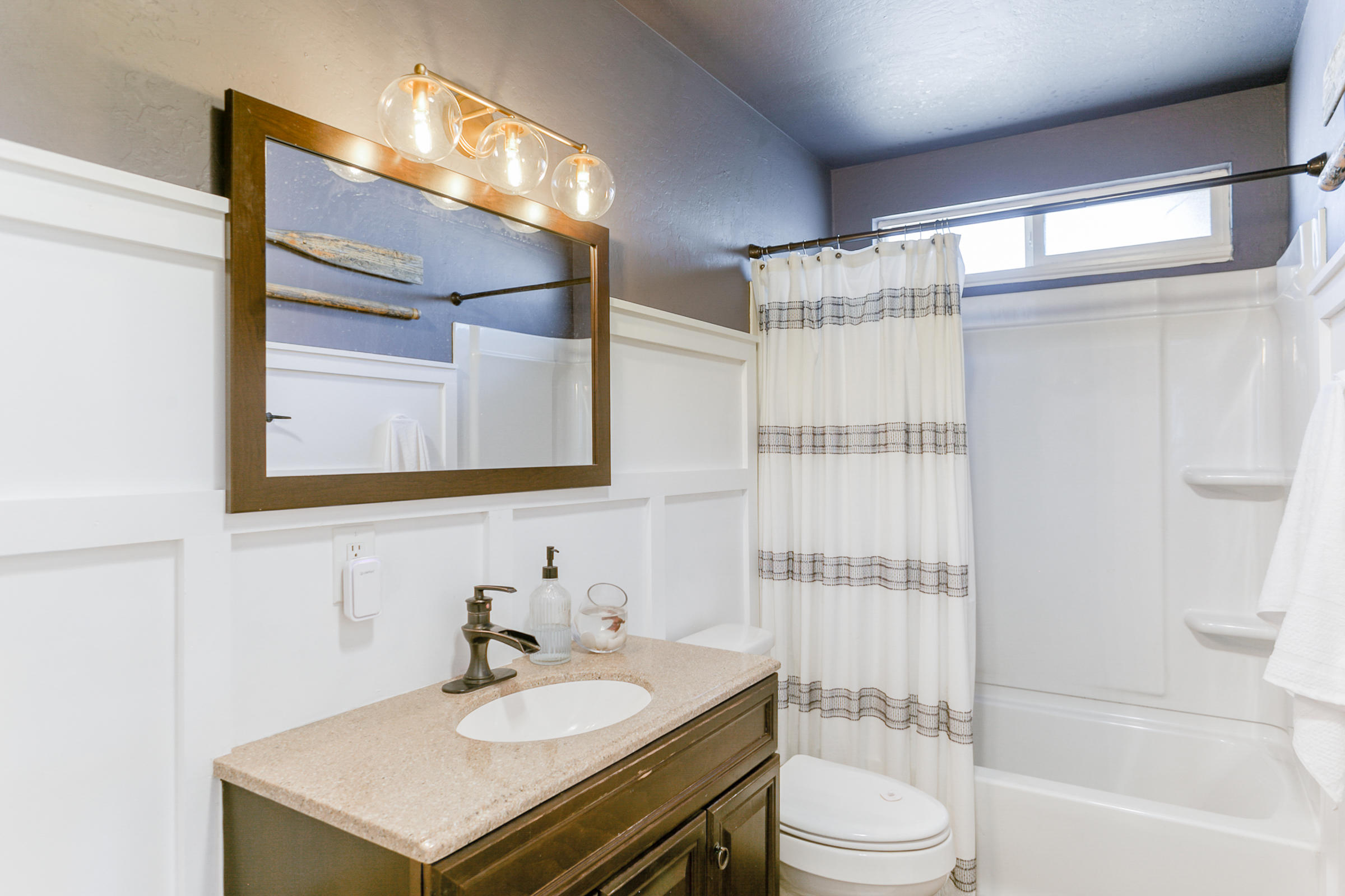 2498 Saturn Redding, CA 96002 - Photo 19 of 40 a bathroom with a sink toilet and shower