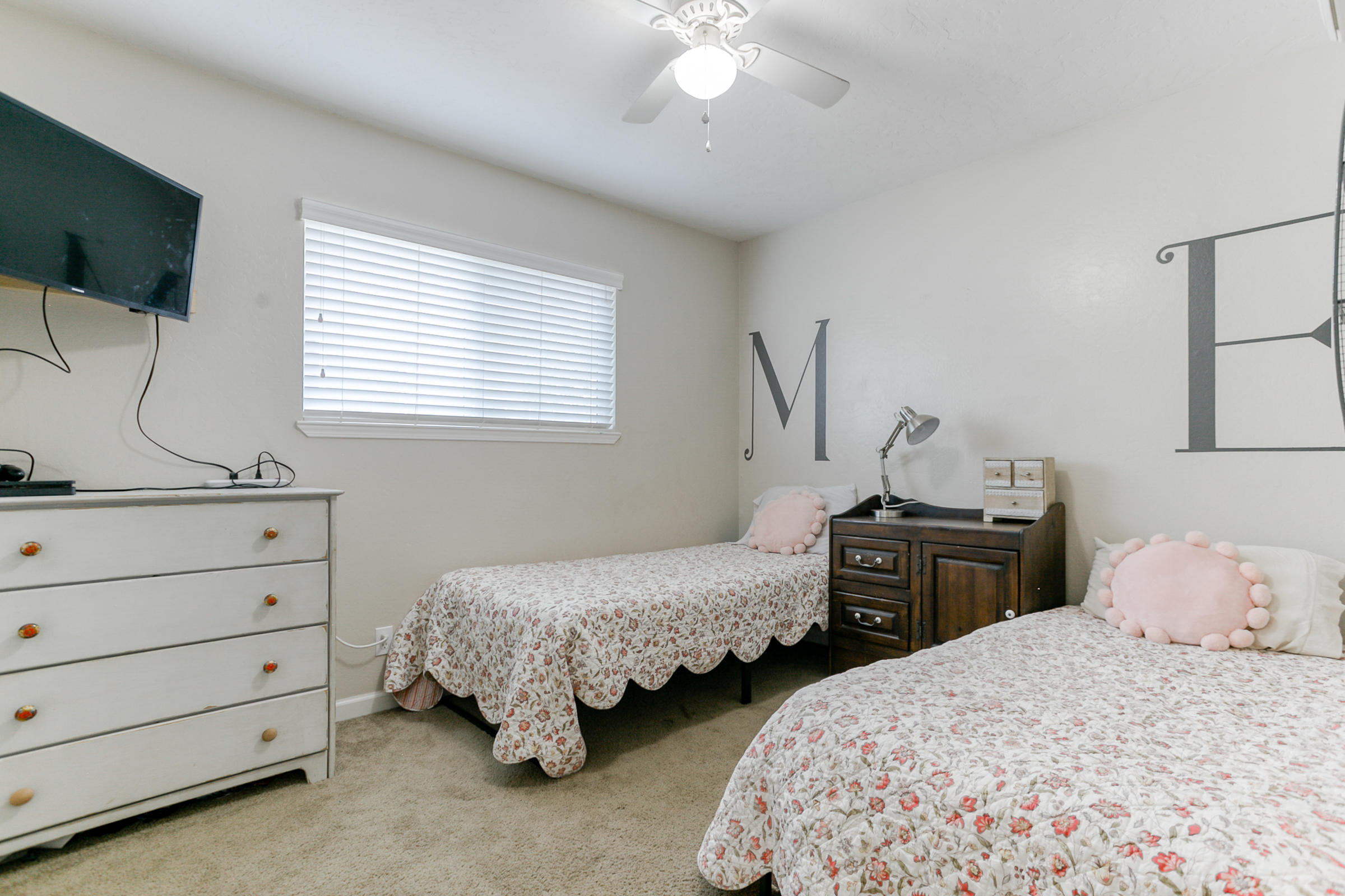2498 Saturn Redding, CA 96002 - Photo 22 of 40 a bedroom with two beds and a flat screen tv