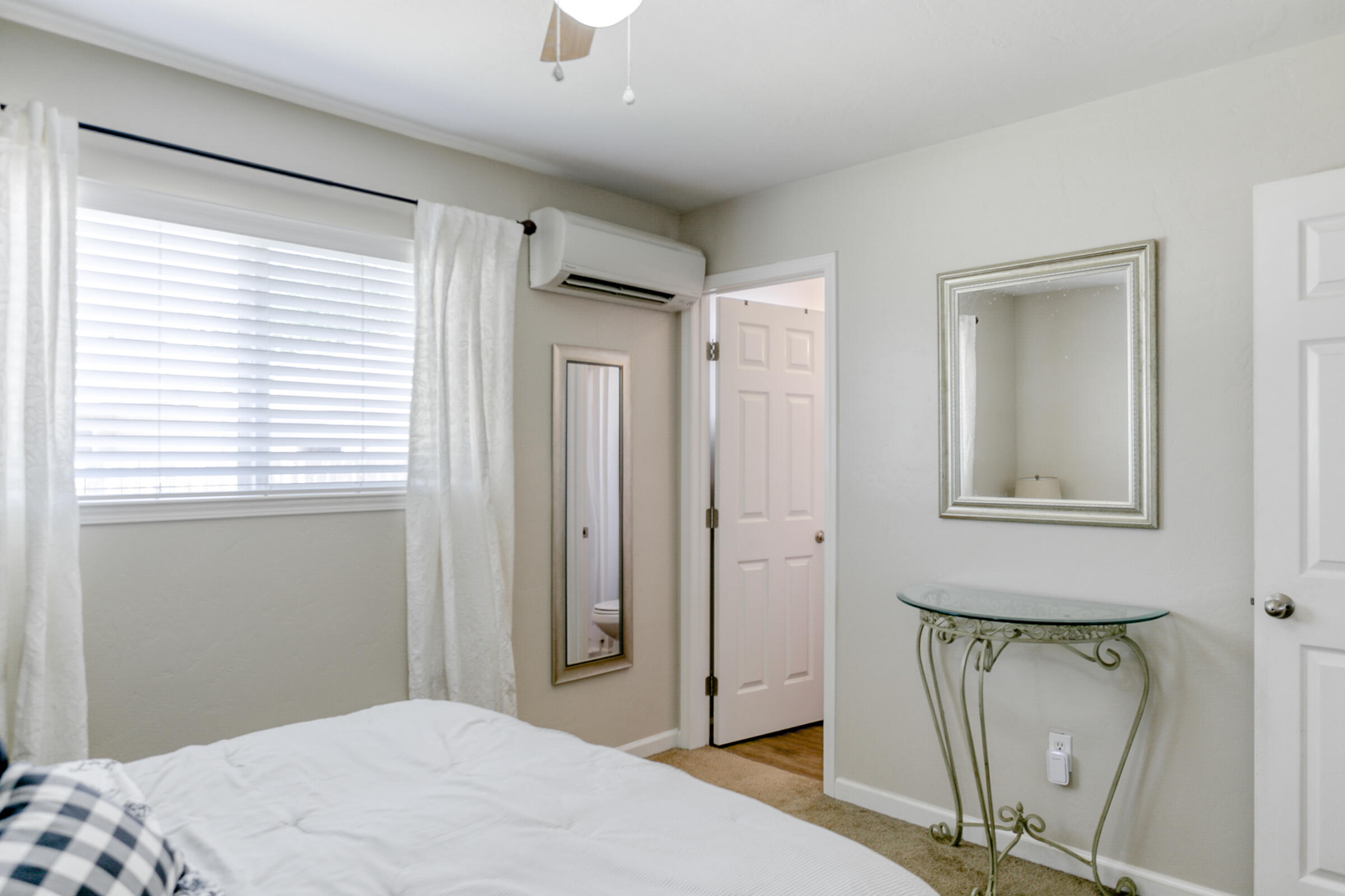 2498 Saturn Redding, CA 96002 - Photo 27 of 40 a bedroom with a bed and a window