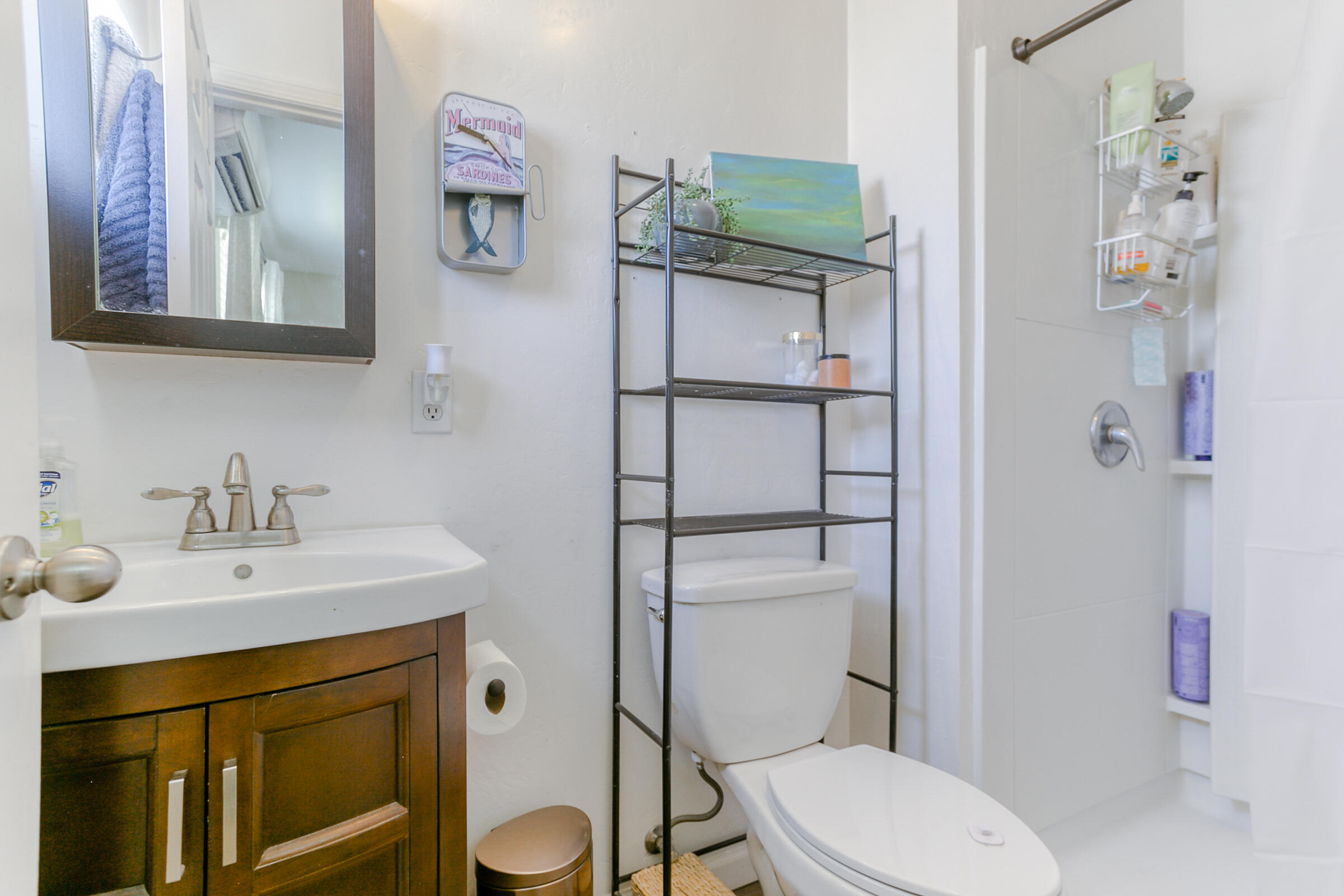 2498 Saturn Redding, CA 96002 - Photo 28 of 40 a bathroom with a sink toilet and shower