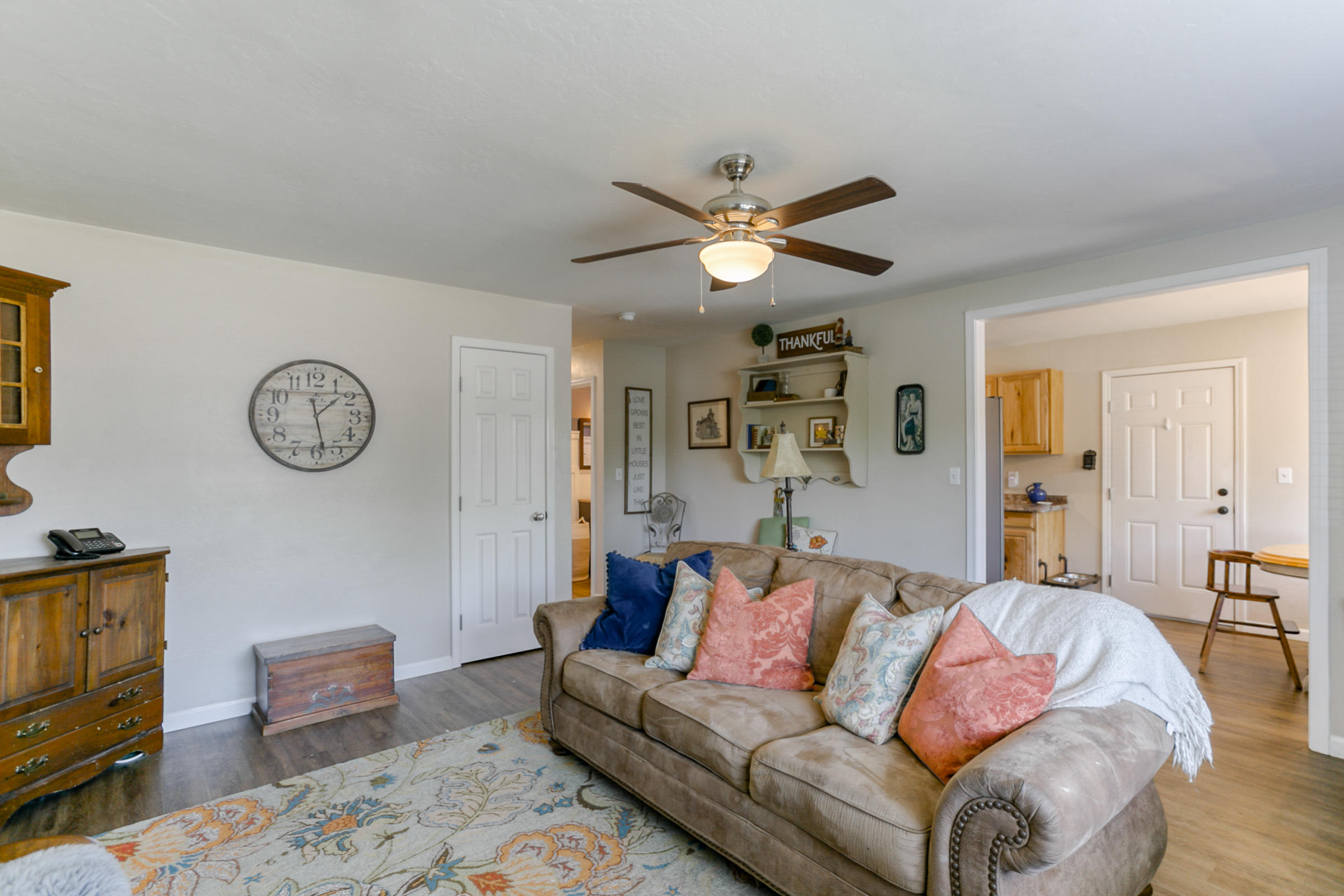2498 Saturn Redding, CA 96002 - Photo 9 of 40 a living room with furniture a couch and wooden floor
