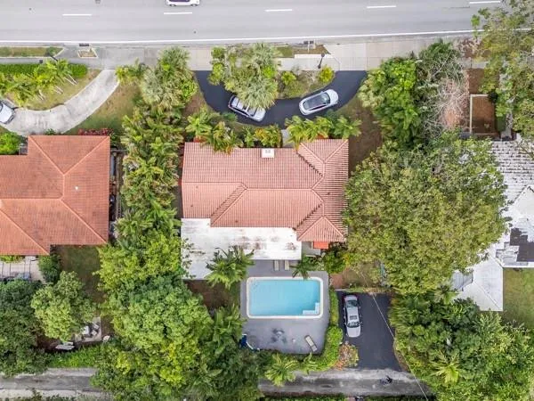a backyard of a house with lots of green space