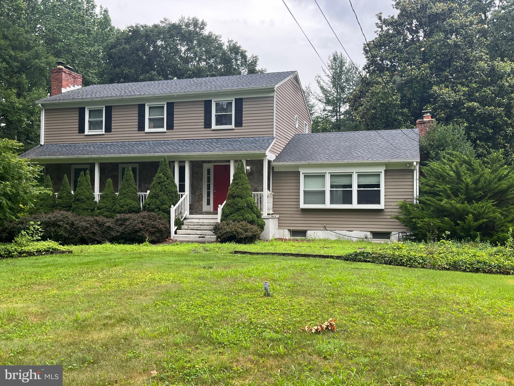 5214 Forge Road Perry Hall, MD 21128 - Photo 2 of 35 a front view of a house with a yard