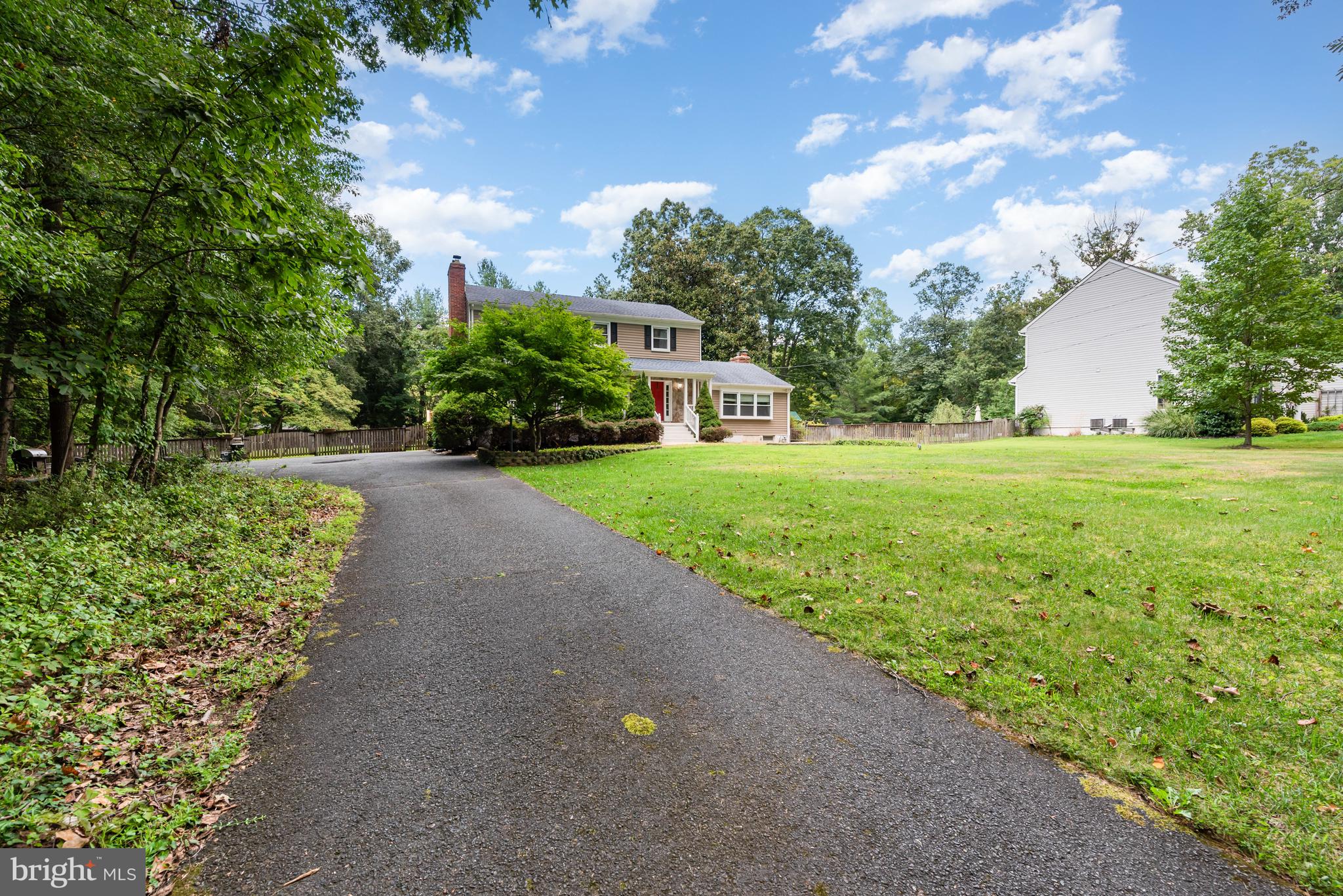 5214 Forge Road Perry Hall, MD 21128 - Photo 4 of 35 a front view of a house with a yard and garage