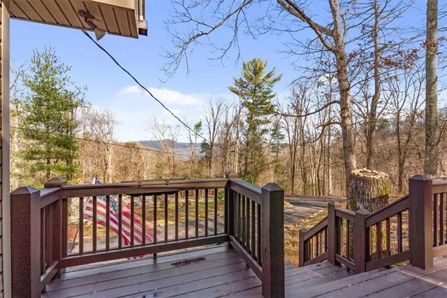 a view of an ocean and a mountain