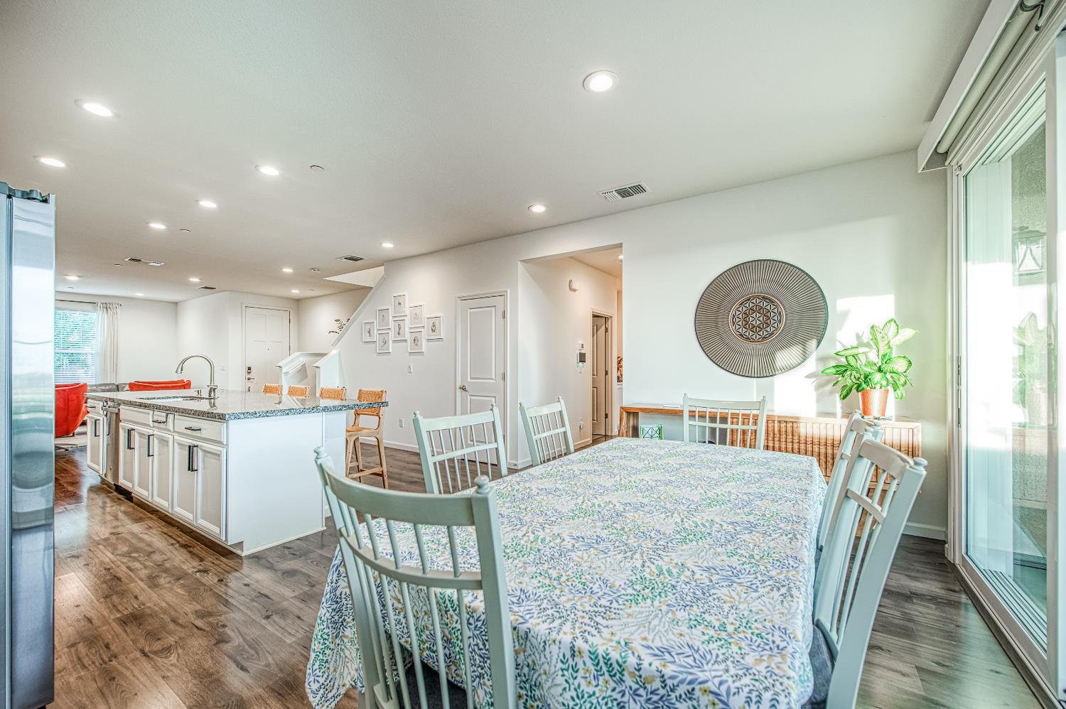 4284 Hillside Road Madera, CA 93636 - Photo 16 of 83 a large kitchen with a table and chairs