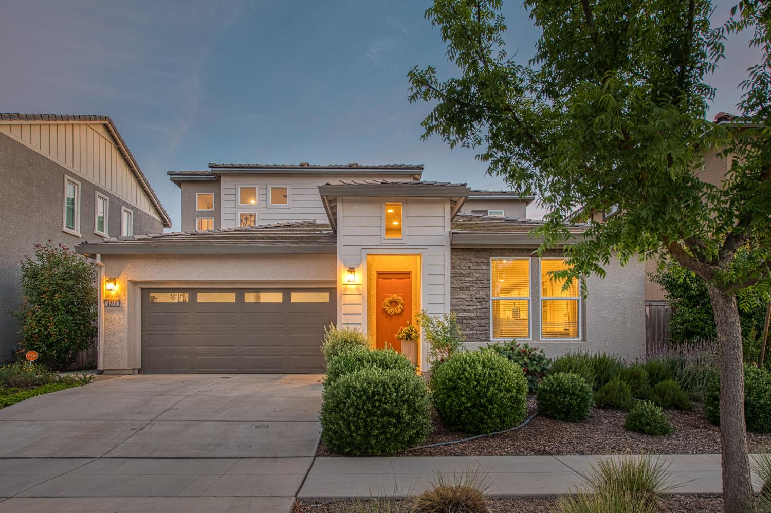 4284 Hillside Road Madera, CA 93636 - Photo 2 of 83 a front view of a house with garden