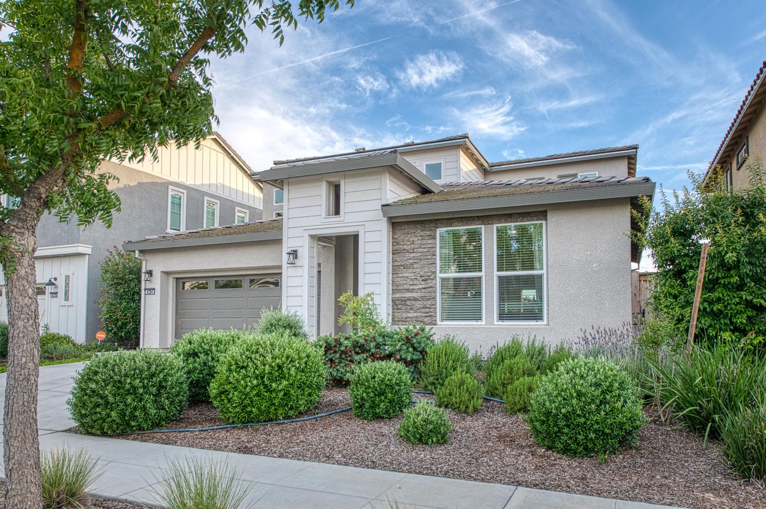 4284 Hillside Road Madera, CA 93636 - Photo 57 of 83 a front view of a house with garden
