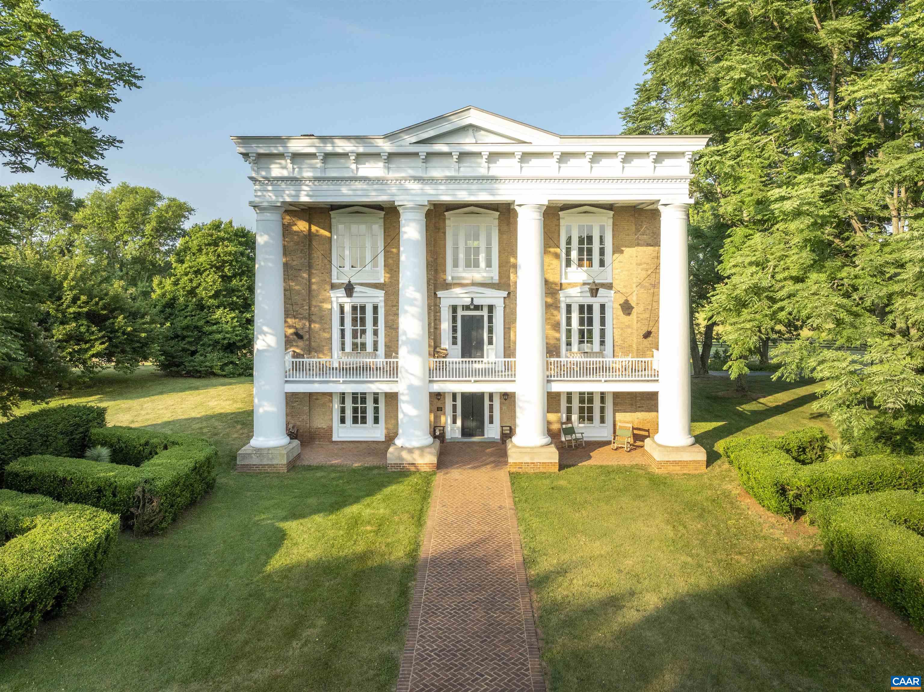 23501 Greenville Road Culpeper, VA 22701 - Photo 2 of 69 a view of a white building with a swimming pool