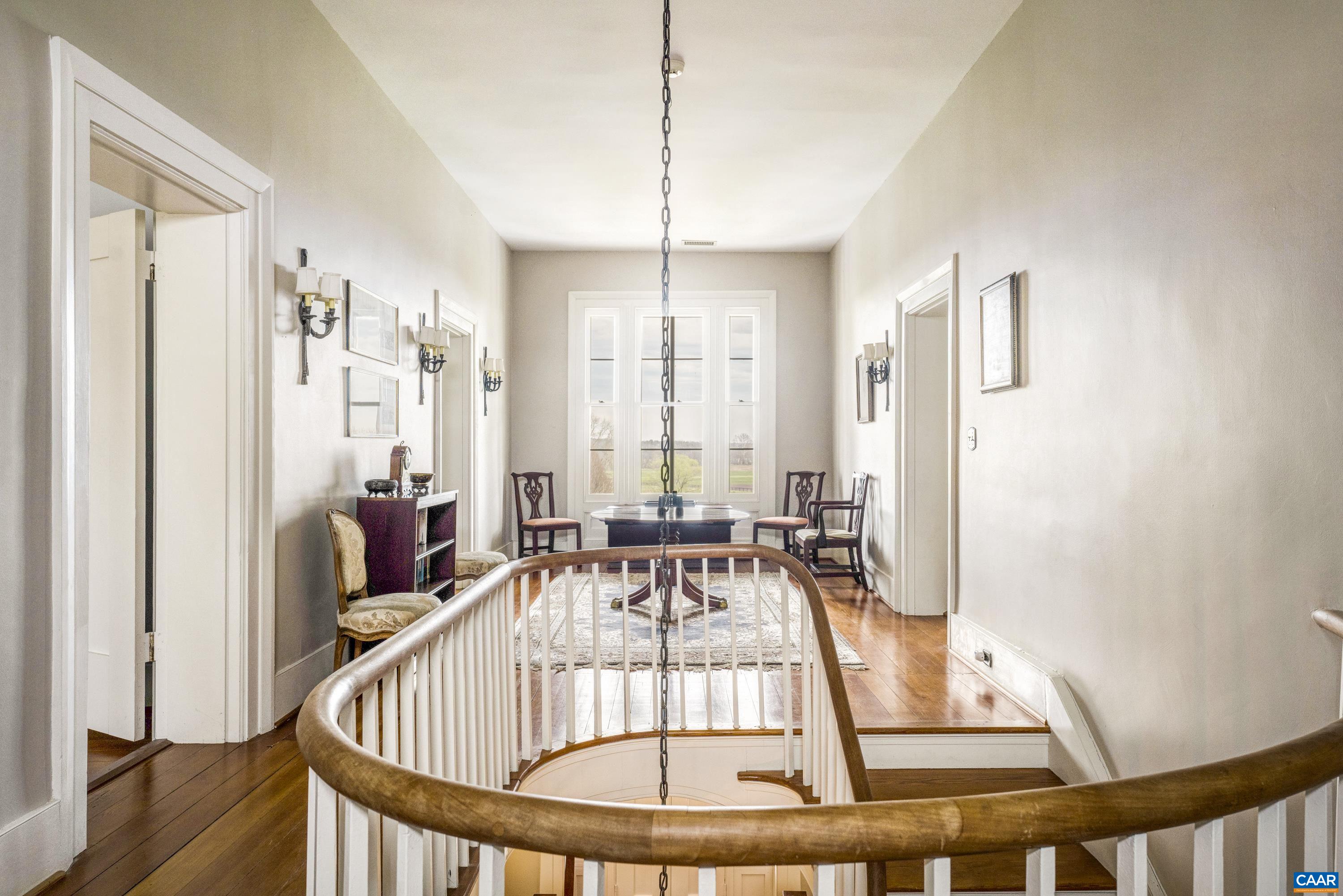 23501 Greenville Road Culpeper, VA 22701 - Photo 24 of 69 a view of a dining room with furniture window and wooden floor