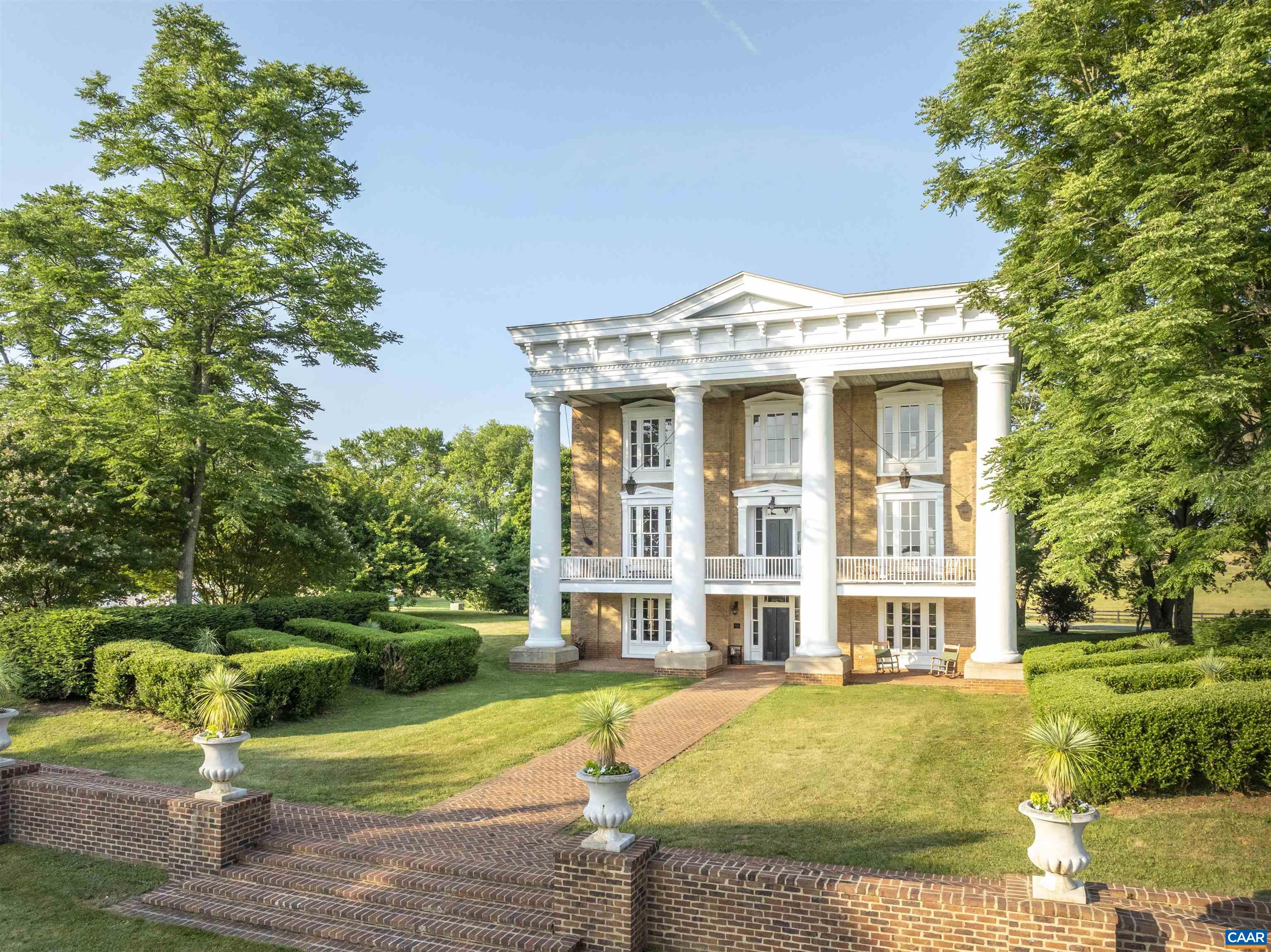23501 Greenville Road Culpeper, VA 22701 - Photo 3 of 69 a front view of a house with a yard
