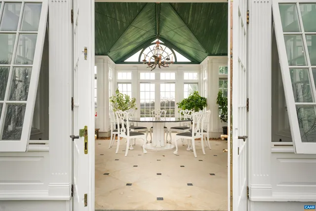 a view of an ocean and trees