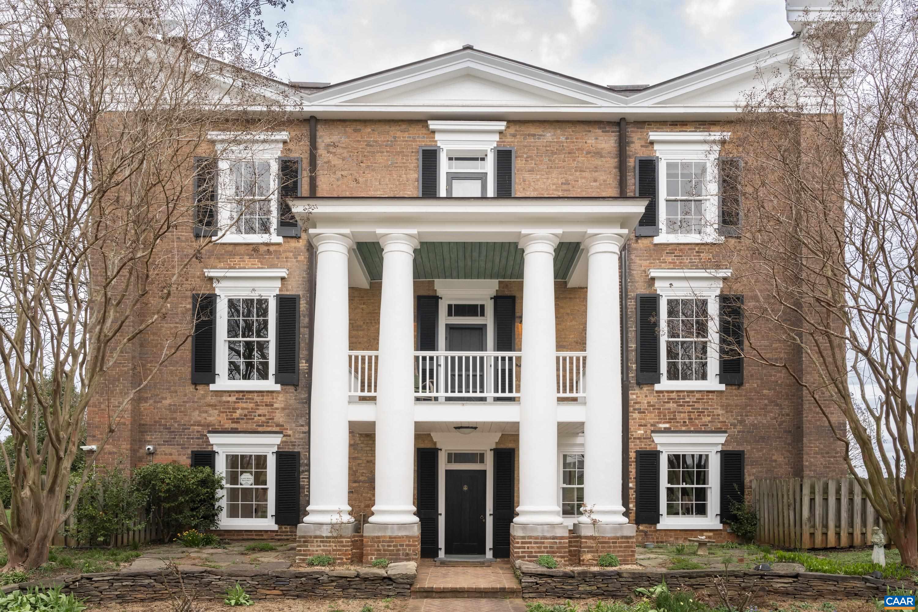 23501 Greenville Road Culpeper, VA 22701 - Photo 5 of 69 a front view of a residential apartment building with a yard