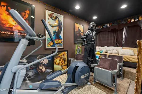a view of gym equipment and children play room