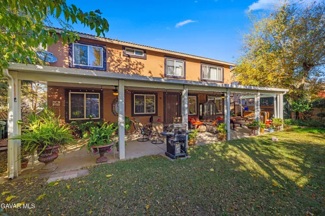 front view of a house with a patio